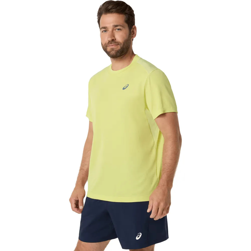 playera deportiva asics court ss top hombre pistachio con paneles de malla para ventilación en cancha tenis