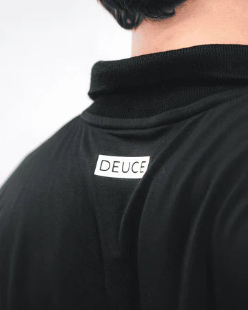camiseta polo negra deuce midnight para jugar pádel con estilo