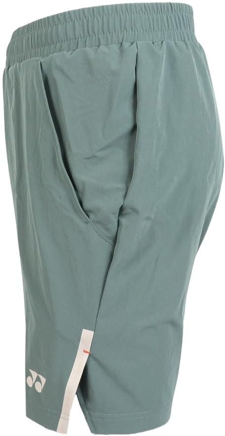 pantalón corto yonex con ajuste cómodo en verde y logo en pierna