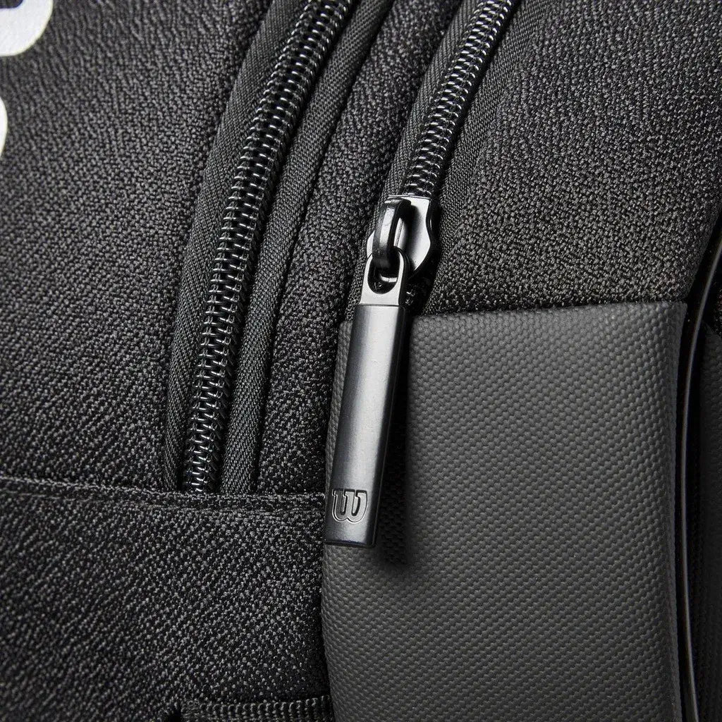 wilson bela super tour negro con bolsillo forrado para objetos delicados