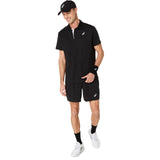 playera asics court polo hombre performance black con inserciones de malla piqué para ventilación