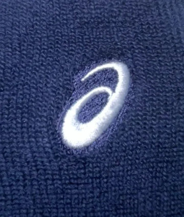 muñequera asics color azul marino ideal para deportes de raqueta