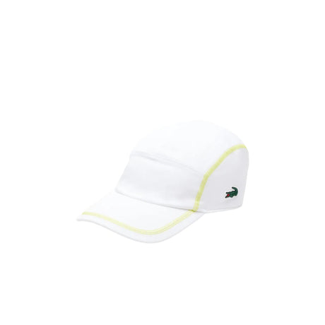 gorra lacoste blanca con detalles amarillos para tenis y pádel