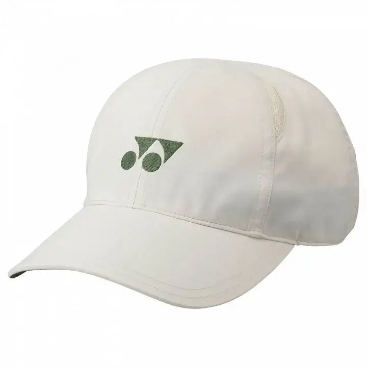 gorra yonex beige con visera curva y ajuste trasero flexible