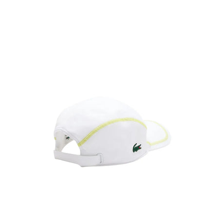 gorra deportiva lacoste blanca con ribetes amarillos flúor