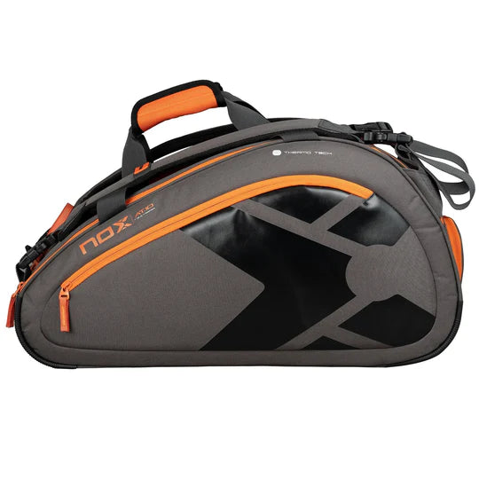 mochila padel nox at10 team gris con detalles en naranja y gran capacidad para equipo de padel