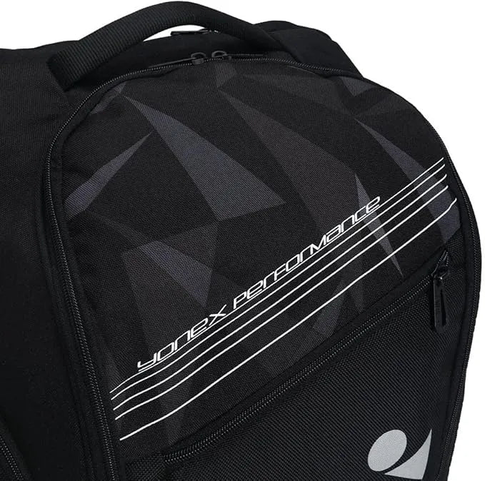 mochila Yonex con logo vertical y compartimentos laterales con cierre