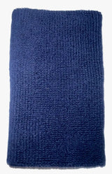 muñequera deportiva azul oscuro de asics con felpa absorbente