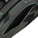 detalle frontal paletero nox at10 team gris verde con cierre resistente y bolsillo ventilado