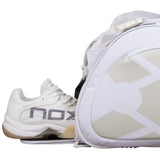 bolsa padel nox blanca con compartimentos multiples para palas ropa y accesorios