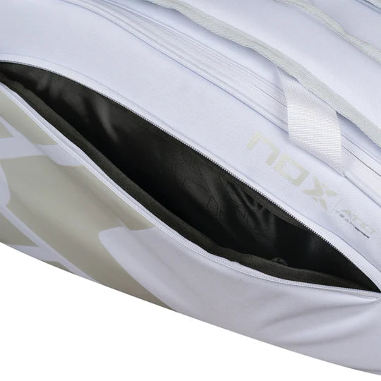 paletero padel nox blanco at10 team con cierre frontal y espacio para accesorios padel