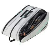 head tour bag l gris con detalles en verde aqua y cremalleras dobles
