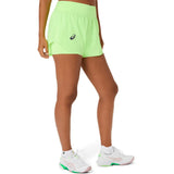 shorts tenis asics match laser cut short mujer illuminate green con diseño perforado transpirable