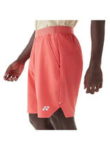 pantalón corto yonex coral con logo blanco en pierna para pádel