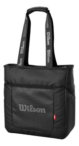 bolso de mano wilson lifestyle gris con espacio para dos raquetas y bolsillos laterales
