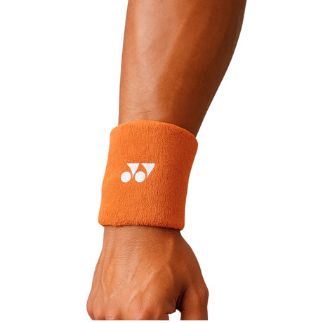 muñequera deportiva yonex en color naranja para control del sudor