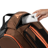 paletero adidas padel pro tour 2026 bronce naranja con bolsillo ventilado para tenis padel